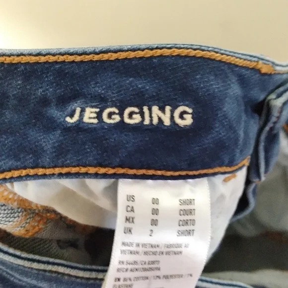 American Eagle Mid Rise Medium Wash Jeggings Size 00 Short - Picture 9 of 10